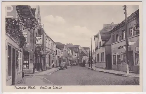 23337 Ak Friesack Mark Berliner Strasse mit Geschäften um 1920