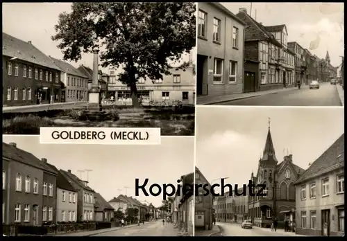 ÄLTERE POSTKARTE GOLDBERG MECKLENBURG STRASSE DES FRIEDENS KARL-MARX-STRASSE SCHRÖDER MATERIALWAREN AK postcard cpa