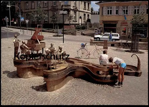 ÄLTERE POSTKARTE DONAUESCHINGEN INNENSTADT MUSIKANTENBRUNNEN BRUNNEN FLÜGEL PIANO OPEL Ansichtskarte postcard AK cpa