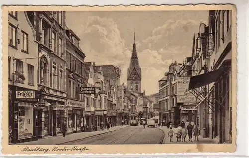 50383 Ak Flensburg Straßenansicht mit Geschäften 1941