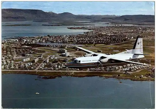 Iclandair Fokker aircraft over Reykjavik -110498