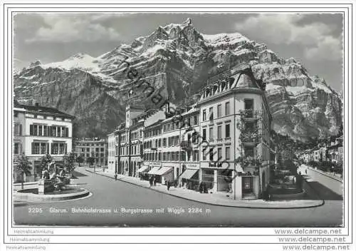 Glarus - Bahnhofstrasse und Burgstrasse mit Wiggis - Foto-AK