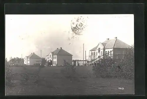 Foto-AK Gulbene, Häuser im Ort