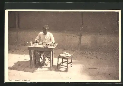 AK The Village Cobbler, Afrikanischer Schuhmacher