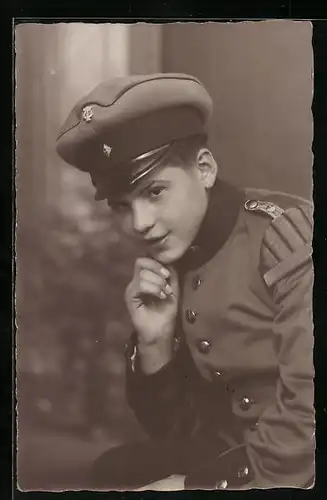 Foto-AK Junger Musikant in Uniform mit Schwalbennest