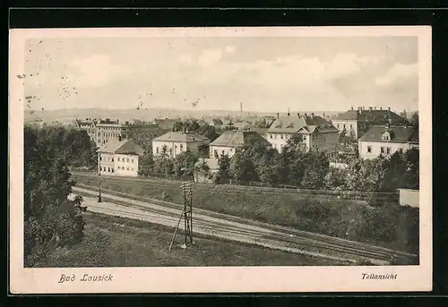 AK Bad Lausick, Teilansicht hinter Bahnschienen