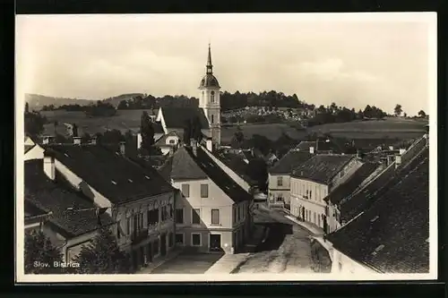 AK Slov. Bistrica, Strassenpartie mit Kirche