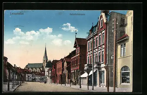 AK Leinefelde, Bahnhofstrasse mit Kirche