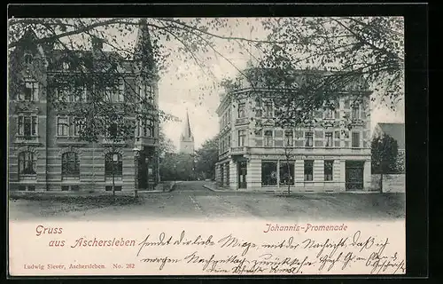 AK Aschersleben, Strasseneck Johannis-Promenade mit Werkzeug- u. Maschinenlager von Otto Weinmeister u. Kirche