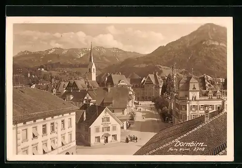 AK Dornbirn, Strassenpartie mit Restaurant, Geschäft von Xaver Hess u. Kirche