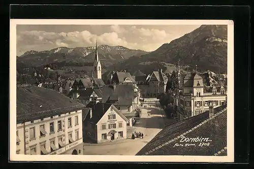 AK Dornbirn, Strassenpartie mit Restaurant und Passanten