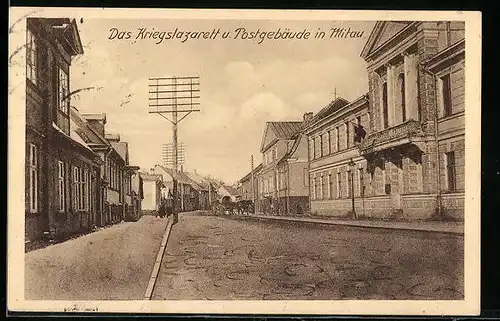 AK Mitau, Strassenpartie mit Kriegslazarett und Postgebäude