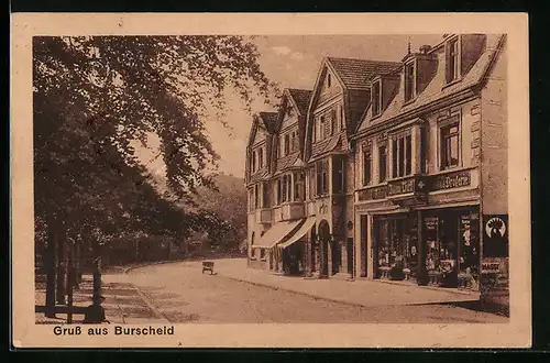 AK Burscheid, Strassenpartie mit Drogerie Johann Dorff