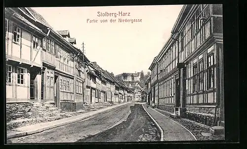 AK Stolberg /Harz, Strasse Niedergasse mit Fachwerkhäusern