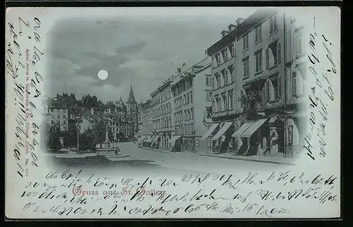 Mondschein-AK St. Gallen, Strassenpartie mit Geschäften