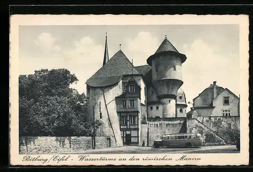 AK Bitburg / Eifel, Wassertürme an den römsichen Mauern, Autobus