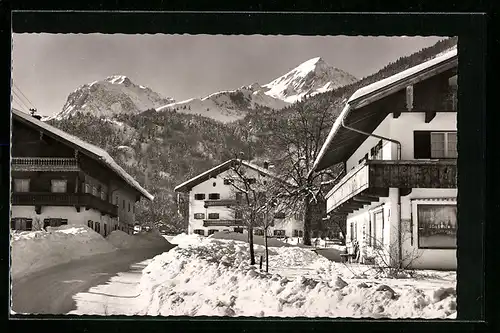 AK Ettenhausen, Ortspartie im Schnee mit Geigelstein und Breitenstein