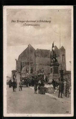 AK Ortelsburg, Strassenpartie mit Ruine und Kriegerdenkmal