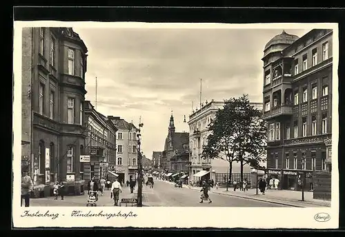 AK Insterburg, Hindenburgstrasse mit Geschäften