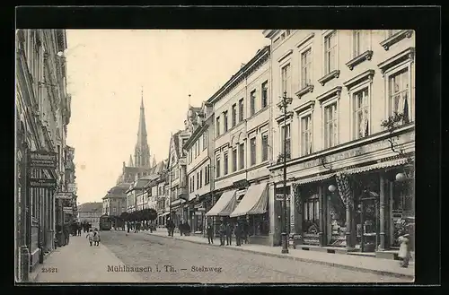 AK Mühlhausen i. Th., Strasse Steinweg mit Geschäften und Strassenbahn