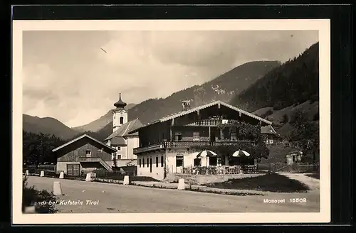 AK Landl bei Kufstein, Ortspartie mit Gasthof zum Krämerwirt und Kirche