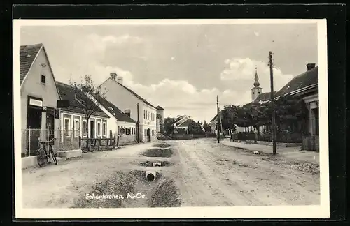 AK Schönkirchen, Strassenpartie mit Kirche