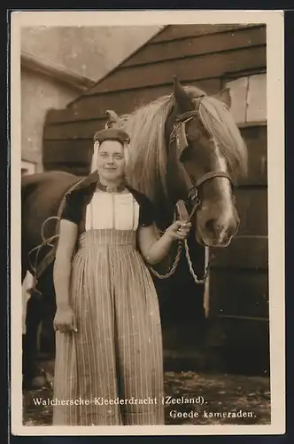 AK Walcheren, Frau in Tracht mit Pferd