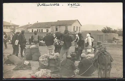 Foto-AK Marktszene mit Packesel und Blick auf Häuser