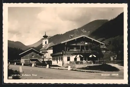 AK Landl bei Kufstein, Ortspartie mit Gasthof zum Krämerwirt und Kirche