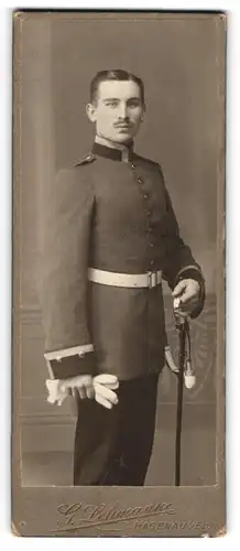 Fotografie G. Lehmann, Hagenau i. Els., Uffz. in Uniform mit Säbel und Portepee