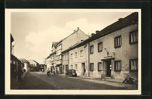 AK Kostelec nad Labem, Strassenpartie mit Geschäft