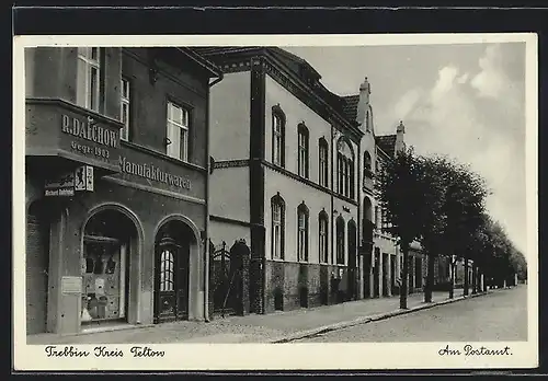 AK Trebbin /Kr. Teltow, Manufakturwaren R. Dalchow und Postamt mit Strasse