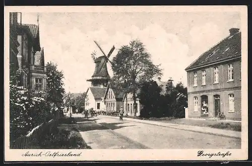 AK Aurich / Ostfriesland, Georgstrasse mit Windmühle