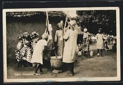 AK Girls pounding rice