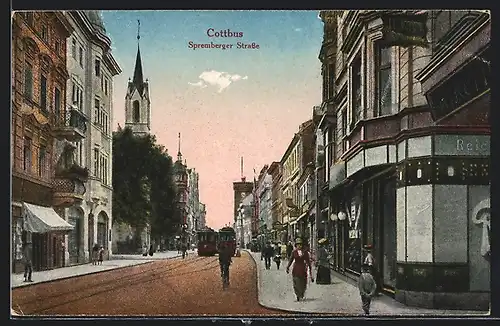 AK Cottbus, Spremberger Strasse mit Kirche und Strassenbahnen