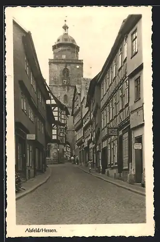 AK Alsfeld /Hessen, Gasthof-Metzgerei, Fachwerkhäuser, Kirche