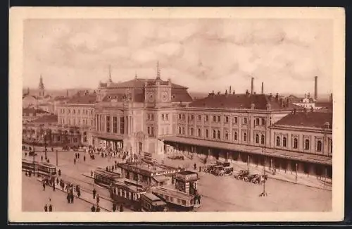 AK Brünn / Brno, Strassenbahnen vor dem Bahnhof