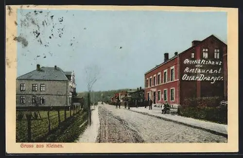 AK Kleinen, Strassenpartie mit Geschäftshaus und Restaurant Oscar Draeger