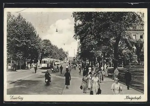 AK Duisburg, Königstrasse mit Strassenbahn und Haltestelle, Denkmal