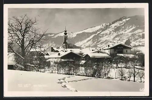 AK St. Veit im Pongau, Ortsansicht mit der Kirche im tiefen Schnee