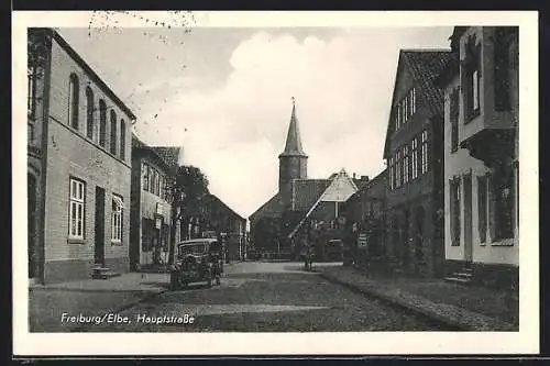 AK Freiburg, Blick in die Hauptstrasse mit Kirchenturm