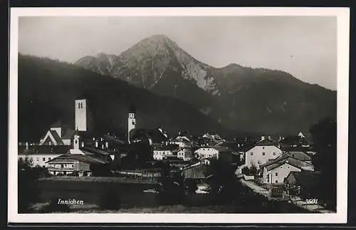 AK Innichen, Ortsansicht gegen das Gebirge