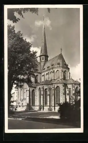 AK Bad Doberan, Strassenpartie mit Kirche