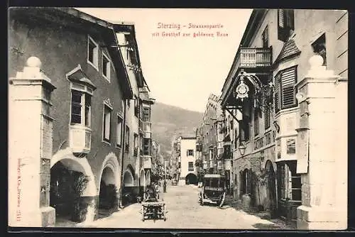 AK Sterzing, Strassenpartie mit Gasthaus zur goldenen Rose, Kutsche