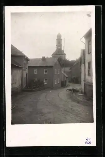 Foto-AK Steckenroth, Strassenpartie mit Kirche