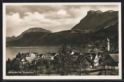 AK Beckenried, Panorama mit Kirche und Bergen