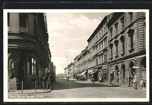 AK Eger, Strassenansicht mit vielen Ladengeschäften