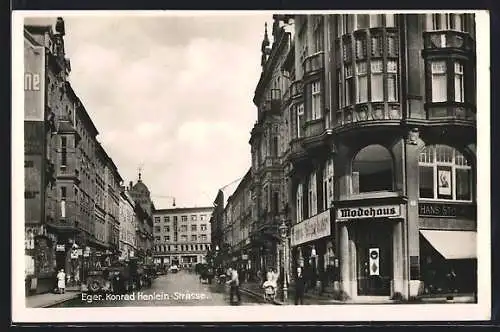 AK Eger, Konrad Henlein-Strasse mit Modehaus Hans Stocker