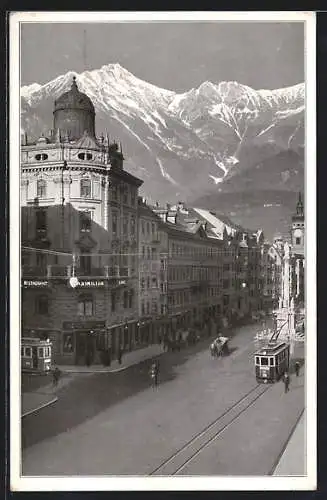 AK Innsbruck, Strassenansicht mit Cafe-Restaurant Maximilian und Strassenbahn