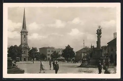 AK Nové Zámky, Strassenpartie mit Kirche